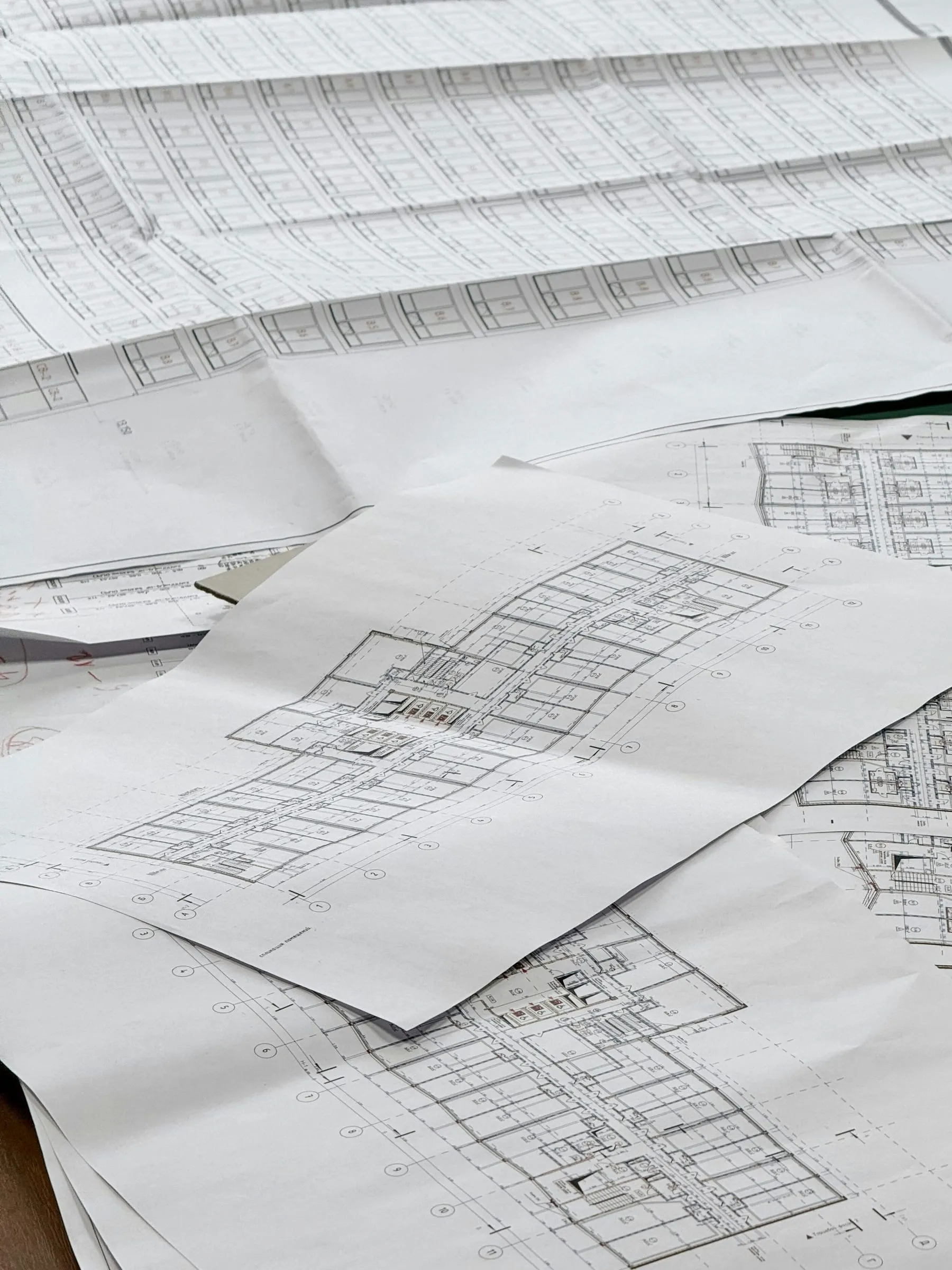 Architectural blueprints spread out on a table