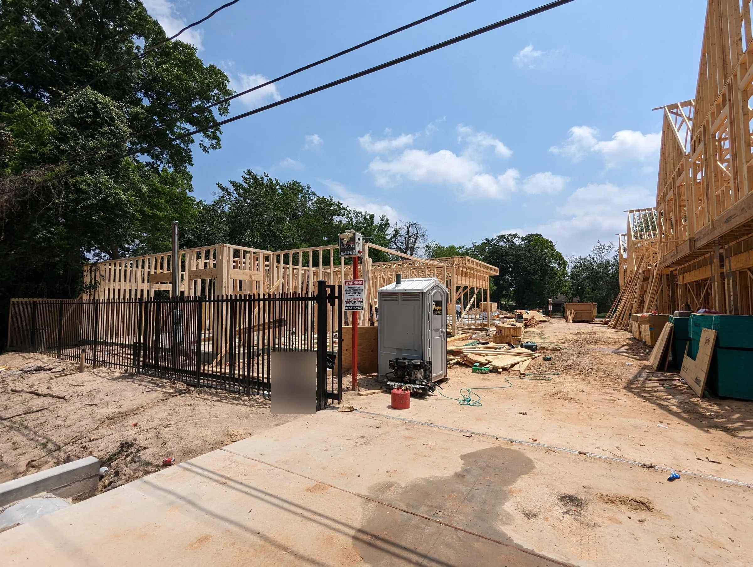 Wood framing of a row of attached two-story homes